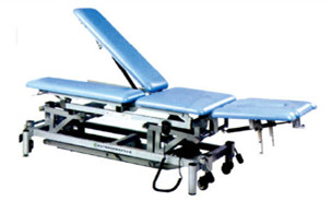 Multi-position treatment bed