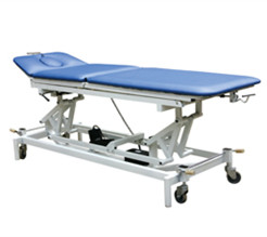 Multi-position treatment bed
